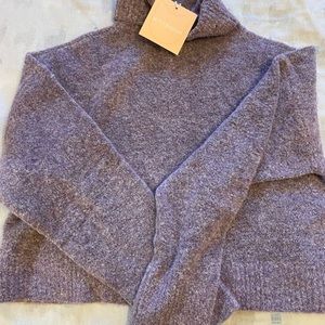 Kittenish purple sweater